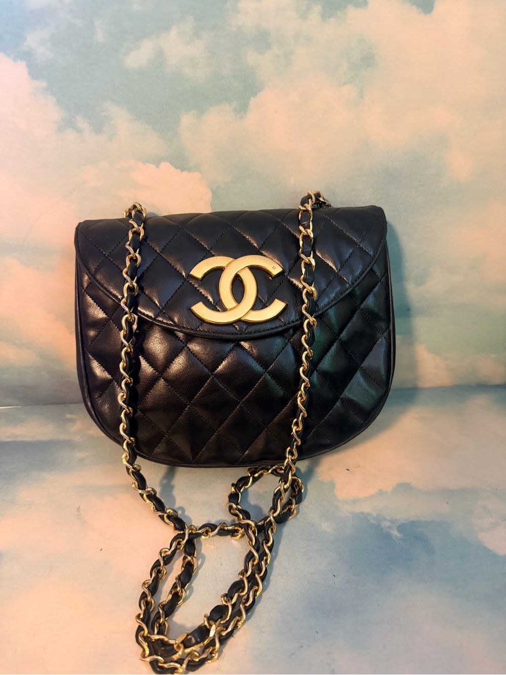 CHANEL Black Quilted CC logo